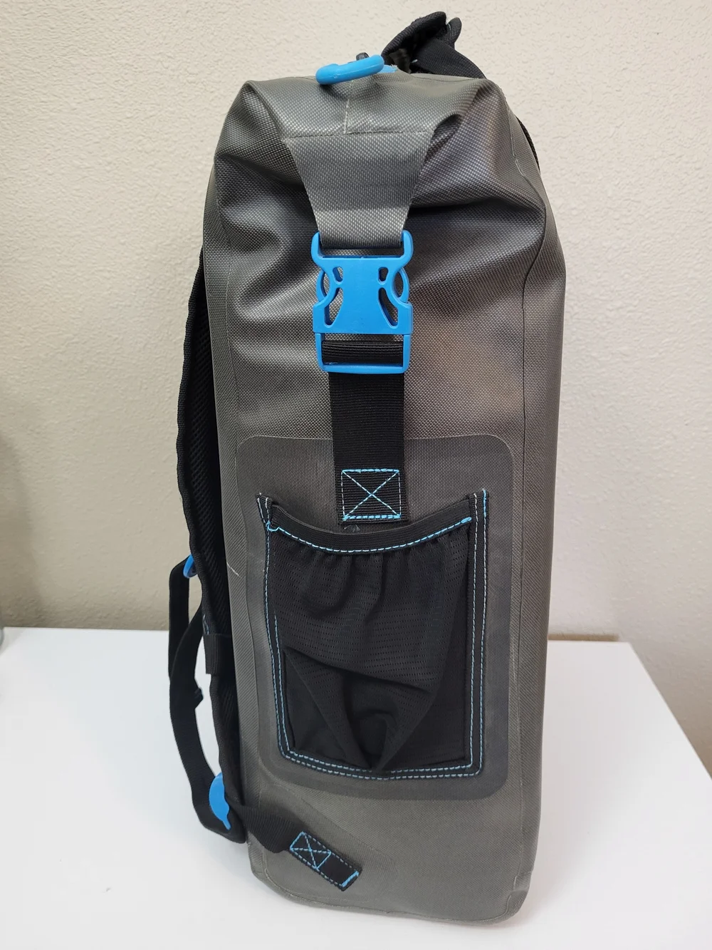 Magellan Outdoors Gray Waterproof Zip Top Backpack with Blue Accents